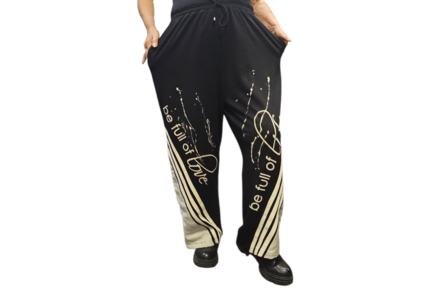 Tweedelig set zwart met beige print en details