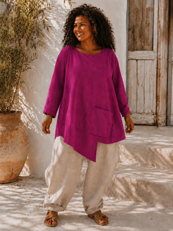 Een eigentijdse tuniek framboos met asymmetrische details 