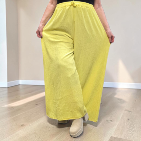 Broek sportyspice geel ruimvallend