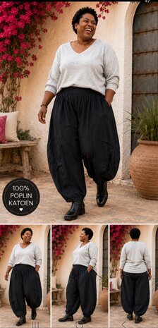 Broek  zwart met leuke details op kniehoogte 
