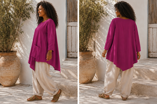 Een eigentijdse tuniek framboos met asymmetrische details 